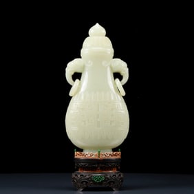 An Exquisite White Jade Beast-Face Pattern Elephant-Ears Bottle
