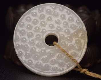 An Exquisite White Jade Pendant