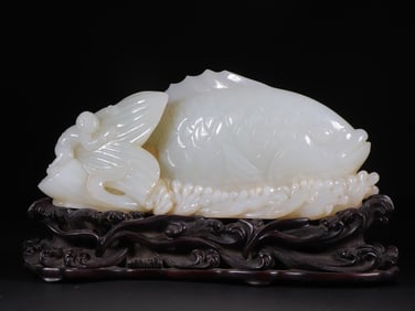 An Exquisite White Jade Fish Ornament,With Zitanwood Base