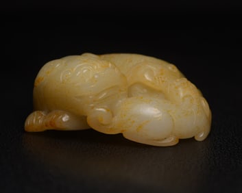 An Exquisite White Jade Auspicious Beast Ornament