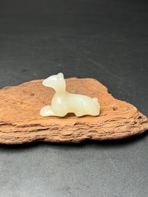 An Exquisite White Jade Dog Pendant