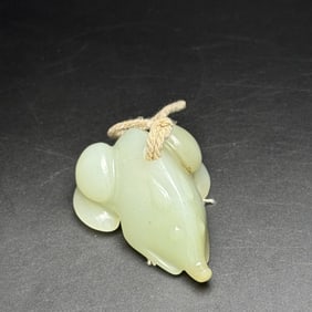 An Exquisite White Jade Pig Pendant