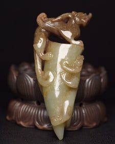 An Exquisite White Jade Auspicious Beast Pendant