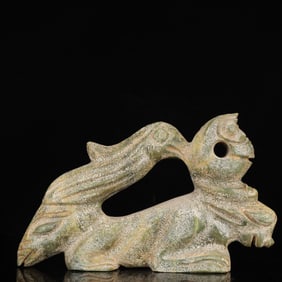 An Archaic Hongshan Culture Yellow Jade Animal Ornament