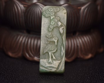 An Exquisite Jadeite Flower and Bird Pattern Pendant