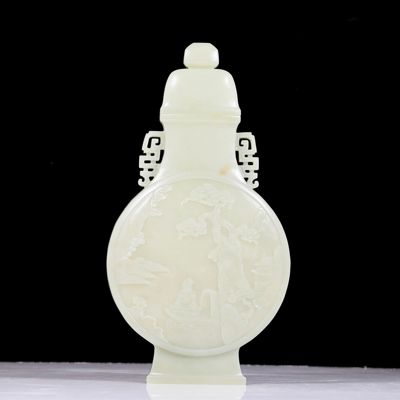 An exquisite white jade landscape figure amphora: An exquisite white jade landscape figure amphora. The jade shows delicate, warm and lustrous qualities. The craftsmanship is flawless, the design is exquisite, and the carvings are exquisite, showing