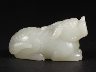 An Exquisite White Jade Auspicious Beast Ornament