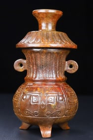 An Exquisite White Jade Double-Ears Tripod Vase