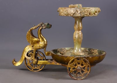 An Exquisite Gilt Bronze Inlaid White Jade Phoenix-Shaped Candlestick