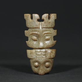 An Exquisite White Jade Beast-Face Pattern Pendant