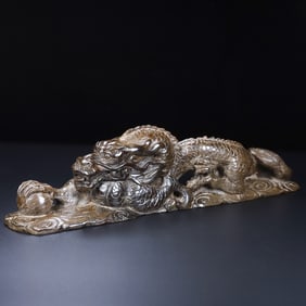An Exquisite White Jade Dragon Ornament