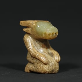 An Exquisite White Jade Buffalo Pendant