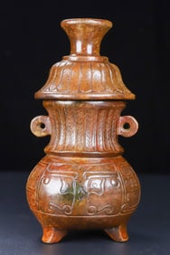 An Exquisite White Jade Double-Ears Tripod Vase