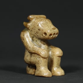 An Exquisite White Jade Buffalo Pendant