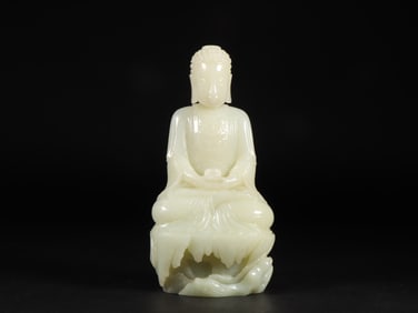 An Exquisite White Jade Buddha Statue