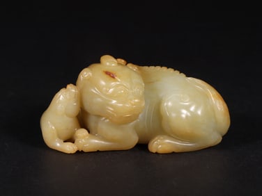 An Exquisite Yellow Jade Auspicious Beast Ornament