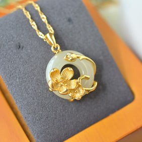 An Exquisite Sterling Silver-Gold Plated Inlaid White Jade Pendant