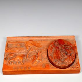 An Exquisite Huanghuali Wood Figure and Elephant Pattern Inkstone