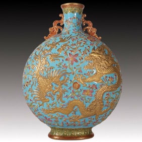 A Rare Enamel Green Ground Carved Dragon and Phoenix Pattern Double-Ears Vase
