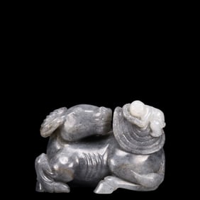 An Exquisite Greenish Jade Buffalo Ornament