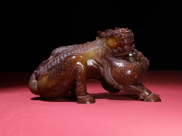 An Exquisite White Jade Auspicious Beast Ornament
