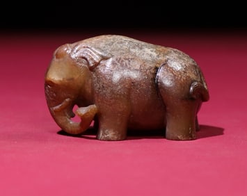 An Exquisite White Jade Elephant Hand Piece