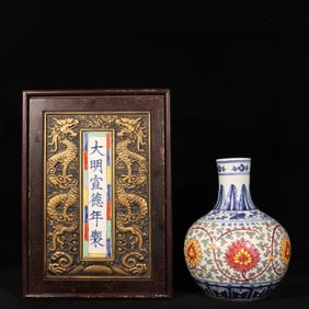 An Exquisite Blue and White Wucai Lotus Pattern Vase