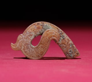 An Exquisite White Jade Dragon Pendant