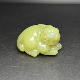 An Exquisite Hotan Jade Auspicious Beast Hand Piece