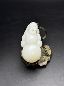 An Exquisite White Jade Gourd-Shaped Hand Piece