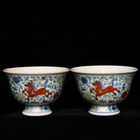 A Pair of Exquisite Doucai Lotus and Horse Pattern Cups