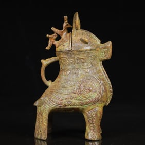 An Archaic Bronze Beast-Face Pattern Tripod Pot