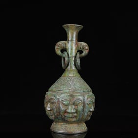 An Archaic Bronze Figure-Face Pattern Elephant-Ears Vase,with Inscription