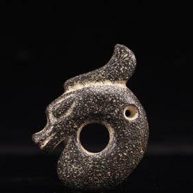 An Archaic Hongshan Culture Coal crystal Pig and Dragon Pendant