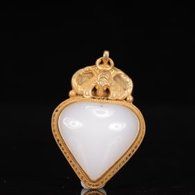 An Exquisite Silver Inlaid White Jade Pendant