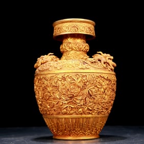 An exquisite gilt bronze vase with floral and dragon patterns