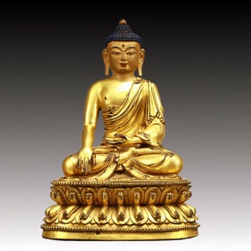 A Solemn Gilt Bronze Statue of Sakyamuni