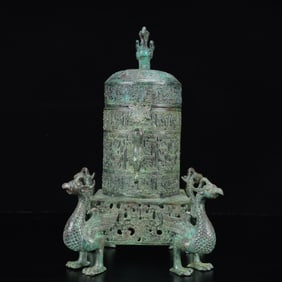 An Archaic Bronze Dragon-Ears Phoenix Legs Vase