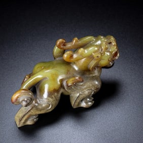 An Exquisite White Jade Auspicious Beast Ornament