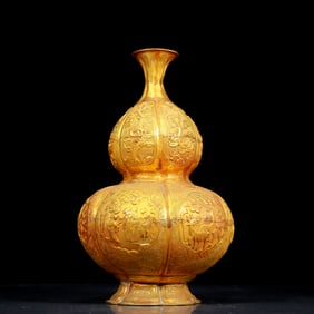 An exquisite gilt bronze figure gourd vase