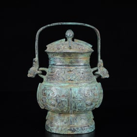 An Archaic Bronze Beast-Face Pattern Beast-Ears Ewer