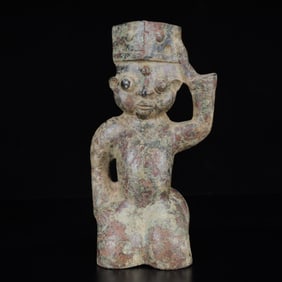 An Archaic Bronze Figure Ornament