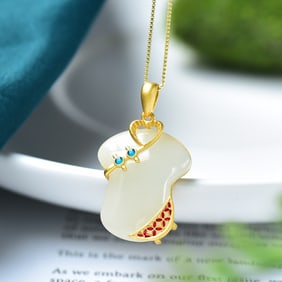 An Exquisite Sterling Silver-Gold Plated Inlaid White Jade Pendant