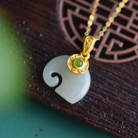 An Exquisite Sterling Silver-Gold Plated Inlaid White Jade Pendant