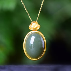 An Exquisite Sterling Silver-Gold Plated Inlaid Sapphire Pendant