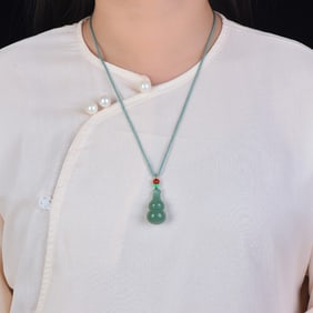 An Exquisite Greenish Jade Gourd Pattern Pendant