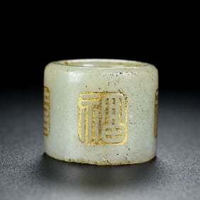 A Rare White Jade Painted Gold Ring
