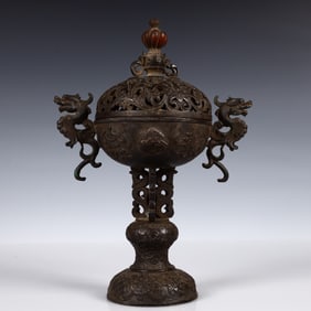 A Solemn Gilt Bronze Eight Treasures Pattern Double-Ears Censer