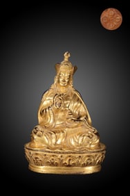 A Solemn Gilt Bronze Statue of Padma Sambhava