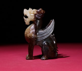 An Exquisite White Jade Auspicious Beast Ornament